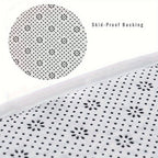 AquaCanyon runner rug with floral-patterned skid-proof backing, featuring white base and black dot pattern detail