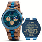 BOBO BIRD wooden watch with blue accents and engraved message, featuring zebra wood band and turquoise chronograph dial