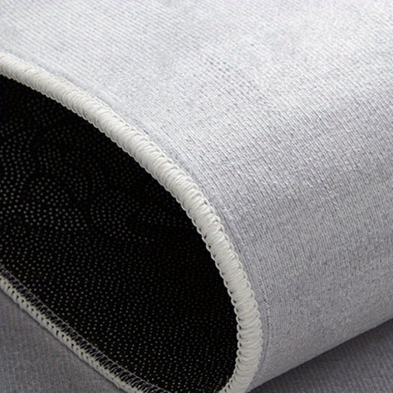 Black Basketball Court Rug featuring non-slip white stitched edges and textured black court surface pattern with premium grip backing