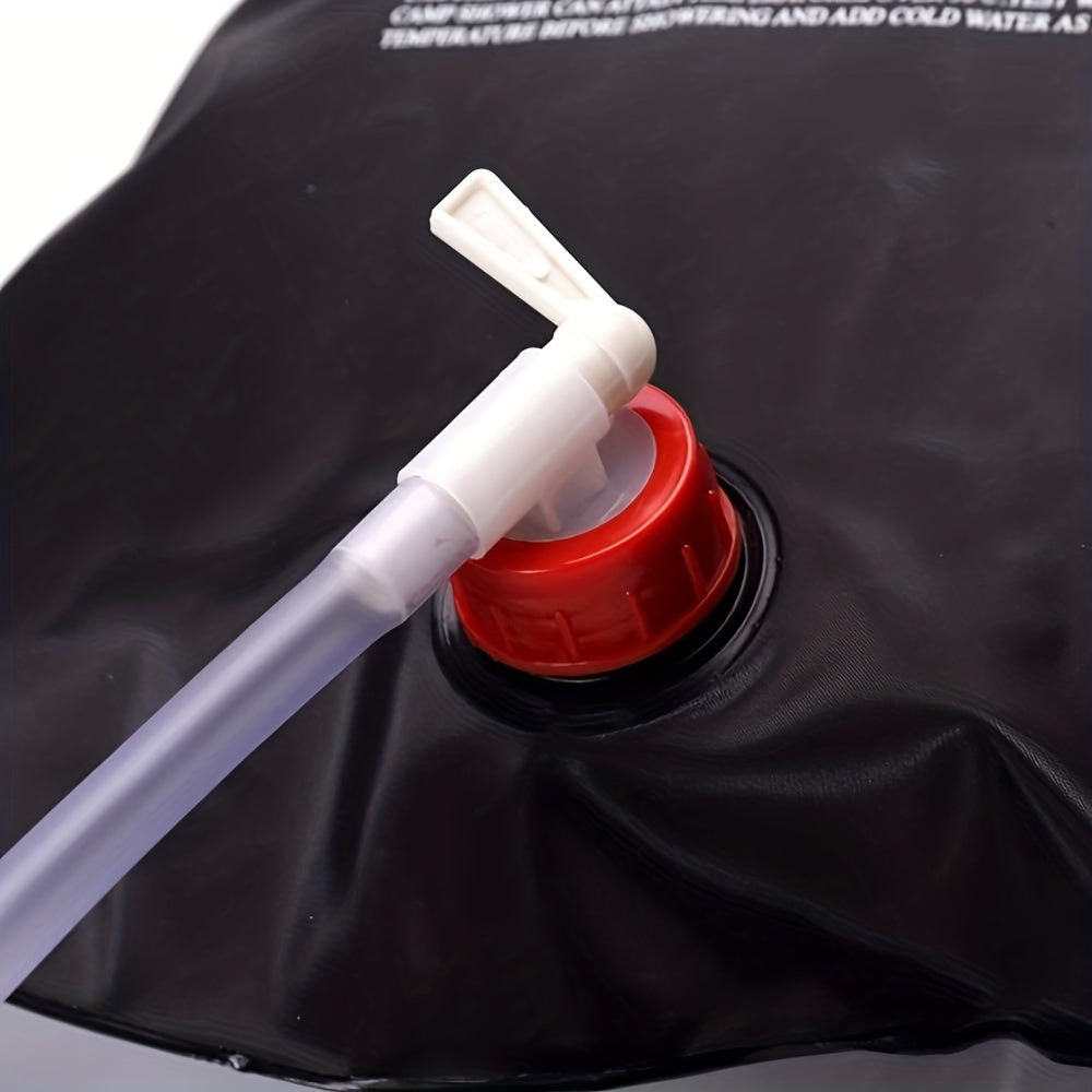 Black portable Camp Shower bag with red cap and white dispensing nozzle - 5-gallon solar camping shower system