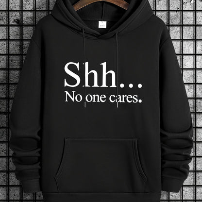 Black pullover hoodie with "Shh... No one cares" text in white letters, featuring front kangaroo pocket and classic design