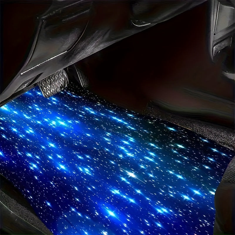 Blue Galaxy Car Floor Mat featuring vibrant starry pattern installed in vehicle footwell with non-slip backing