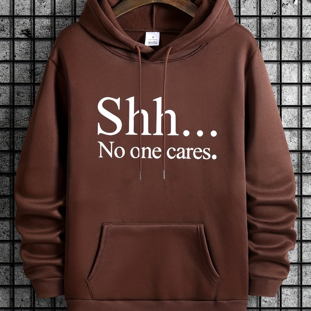 Brown pullover hoodie with "Shh... No One Cares" text in white, featuring kangaroo pocket and classic design