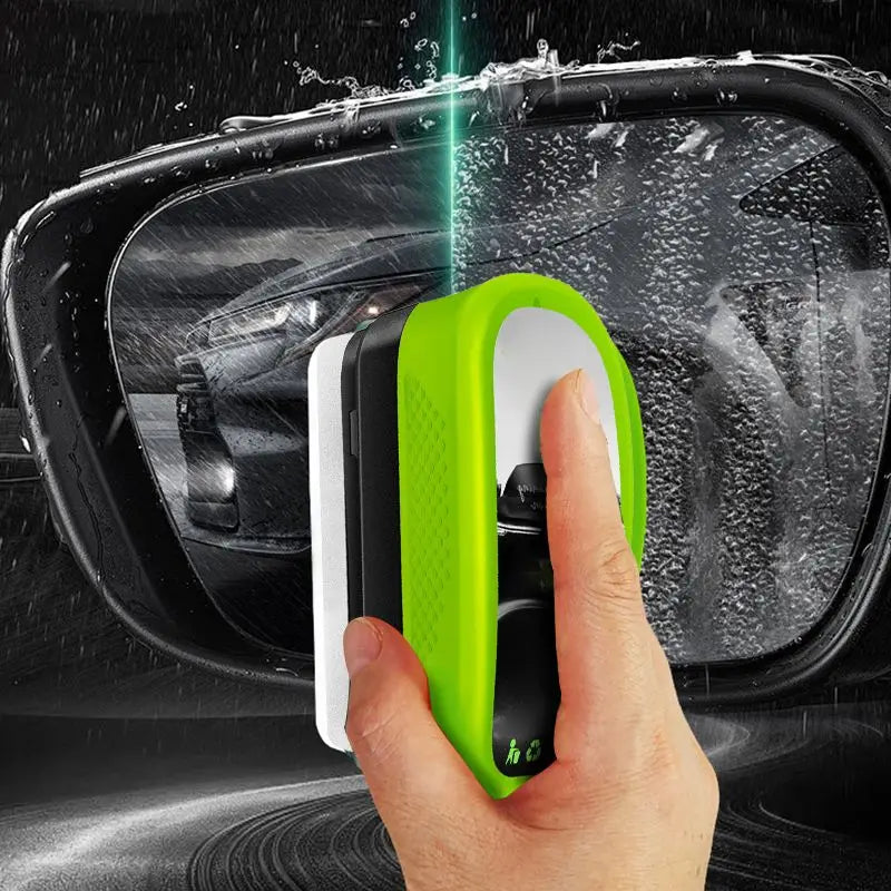 ClearVision windshield cleaner with neon green ergonomic handle removing water drops from car side mirror in rain