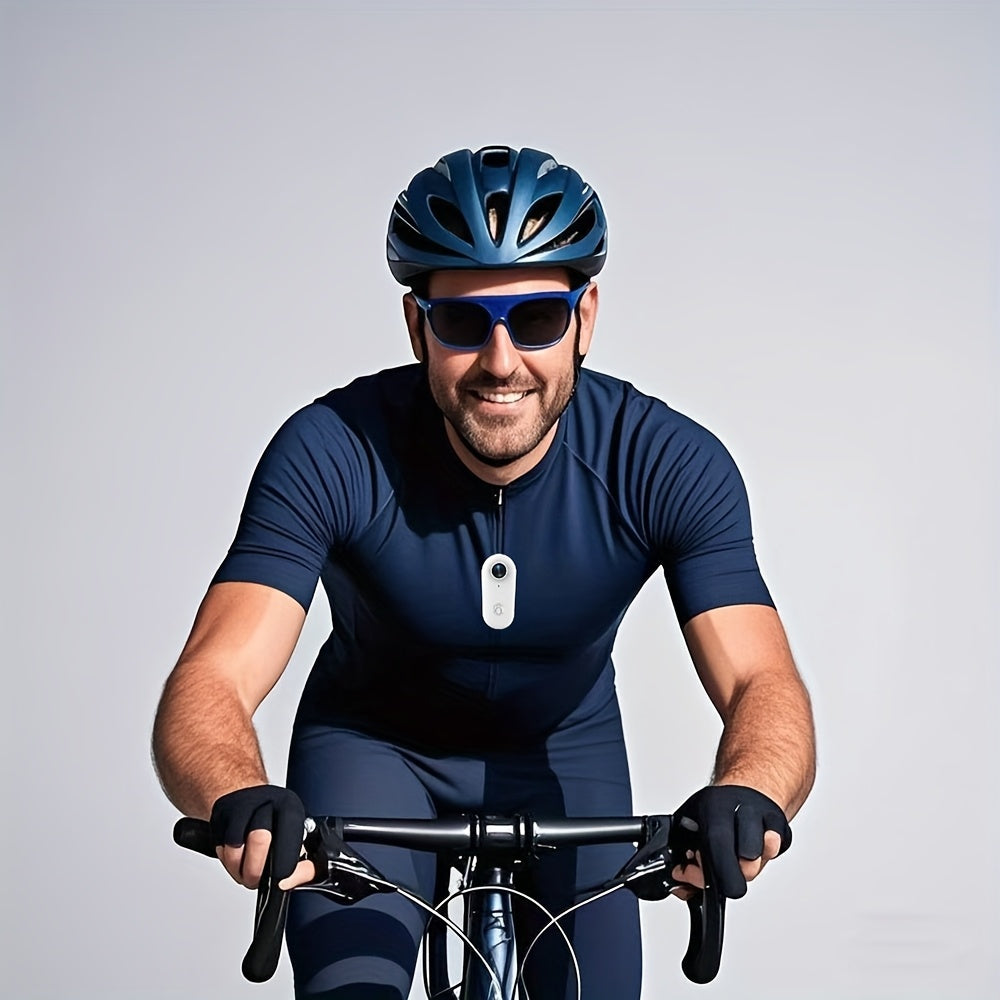 ClipCam 4K action camera shown mounted on cyclist wearing navy jersey - demonstrates hands-free POV recording feature