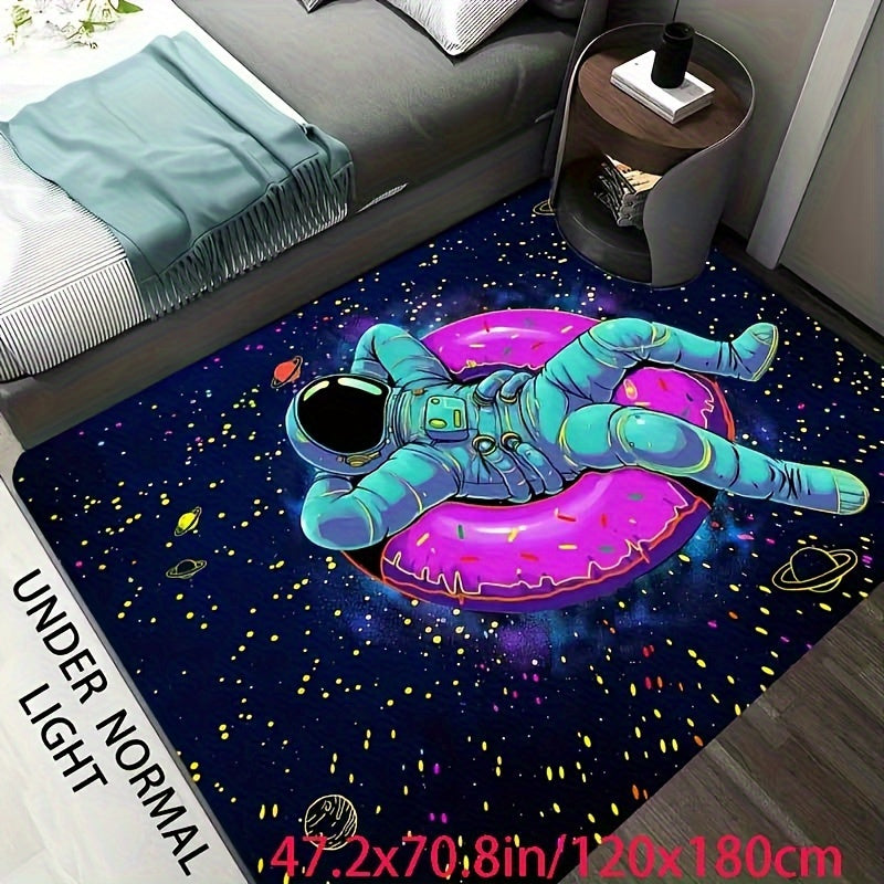 CosmoGlow Astronaut Rug featuring space-suited figure on pink float ring against starry galaxy background in vibrant turquoise and purple
