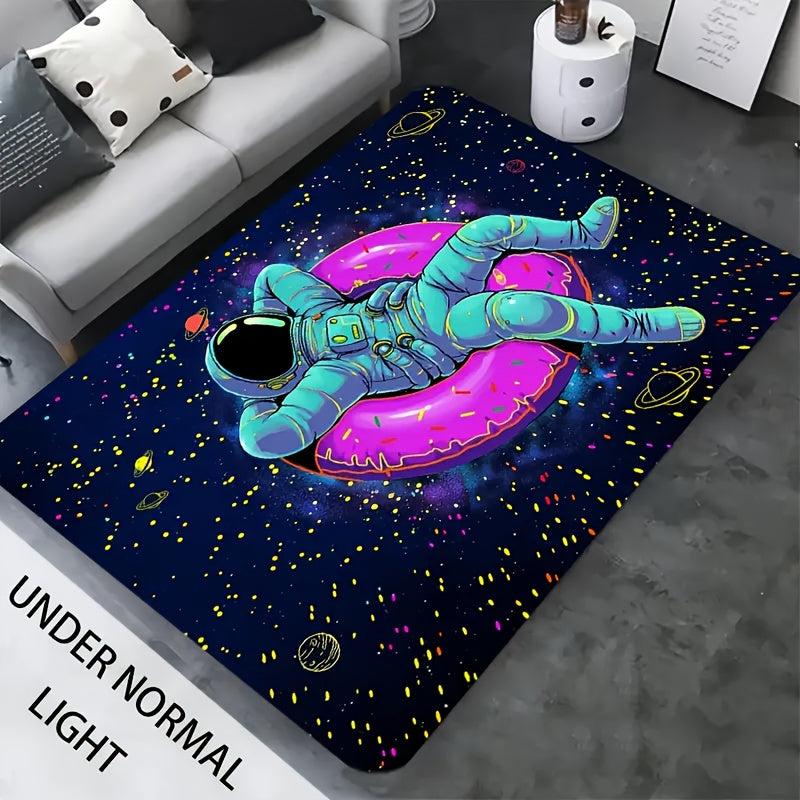 CosmoGlow Astronaut Rug featuring spacesuit figure floating on pink donut amid starry galaxy background in turquoise and navy
