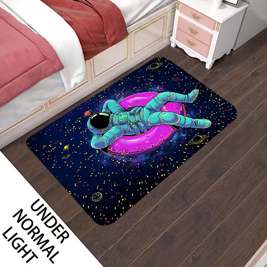 CosmoGlow Astronaut Rug featuring teal spacesuit figure floating on pink donut against starry navy space background