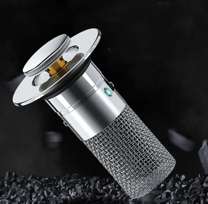 DrainShield drain protector in silver with textured mesh filter and sleek metallic top cap - modern drain guard design