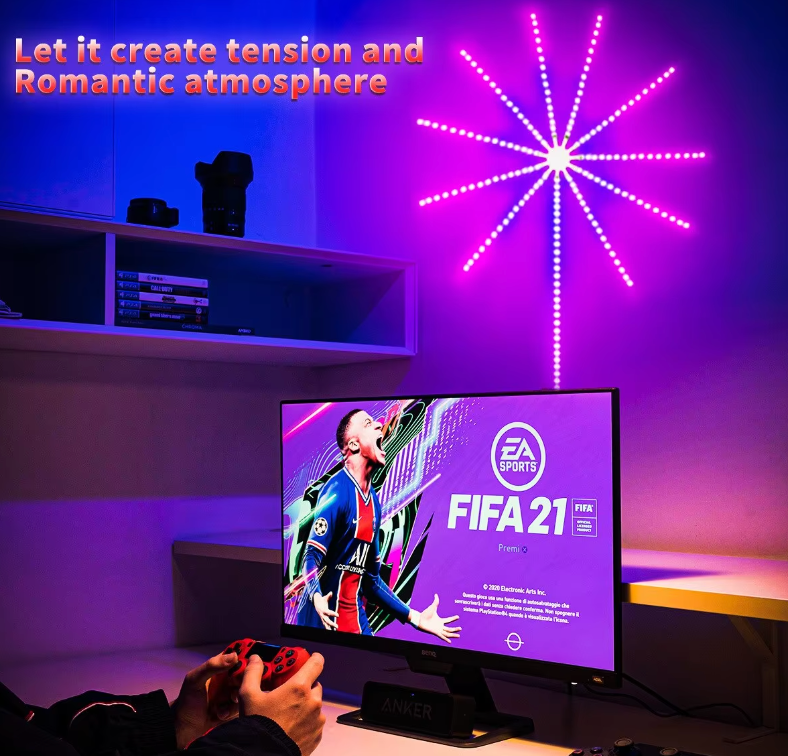 Firework LED starburst wall light illuminating gaming setup with pink and purple ambient glow in modern room