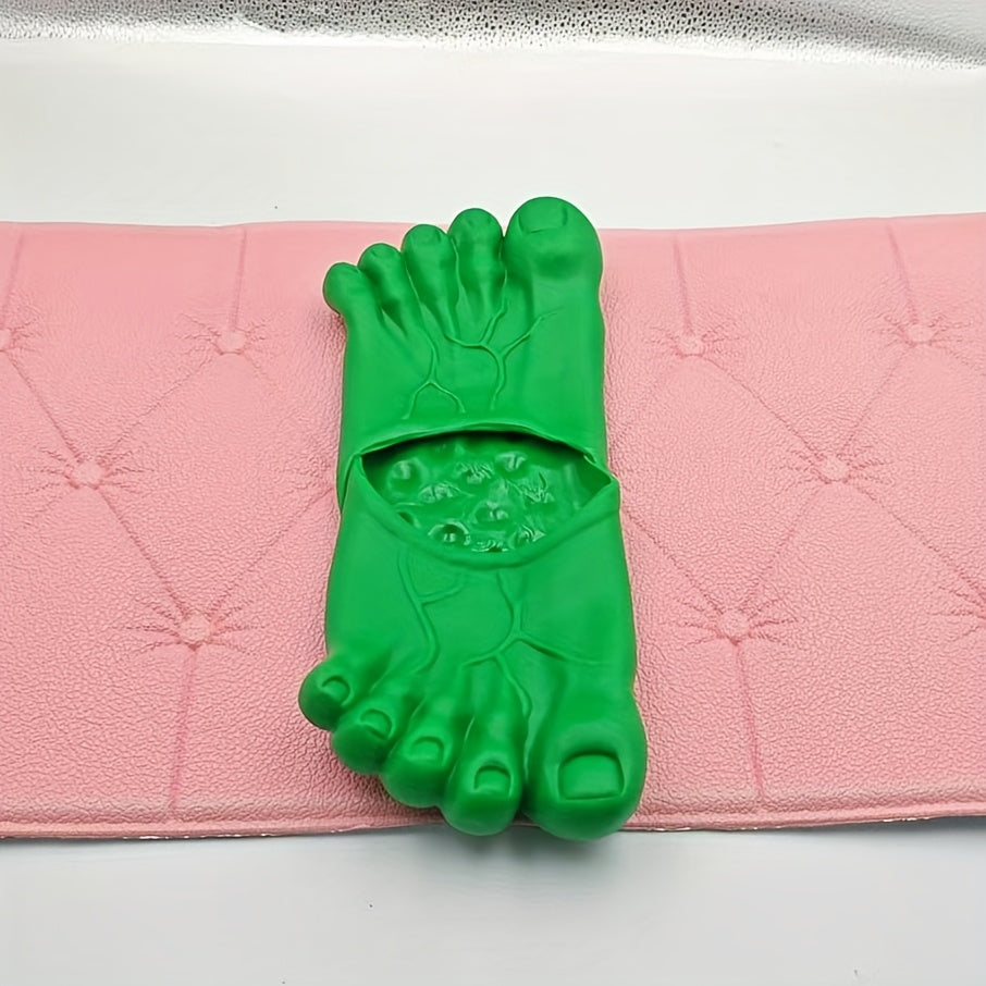 Giant Feet Slippers in bright green with realistic toe details on pink cushioned surface - novelty foot-shaped house shoes