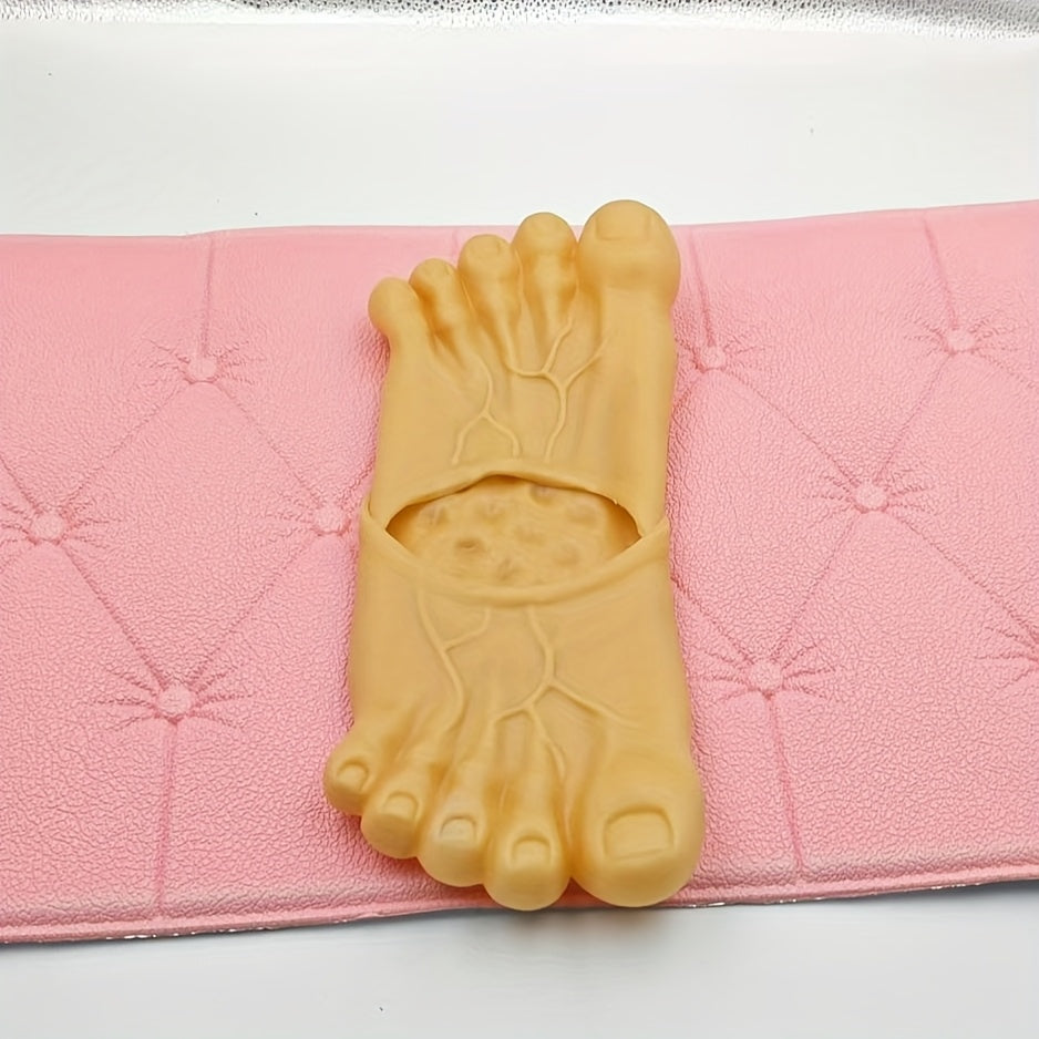 Giant Feet Slippers in realistic beige design with detailed toes and veins displayed on pink cushioned surface