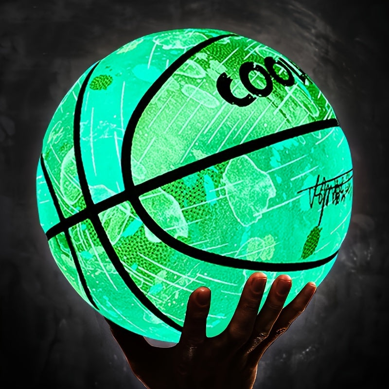 GlowHoop Light-Up Basketball glowing green in the dark while being held