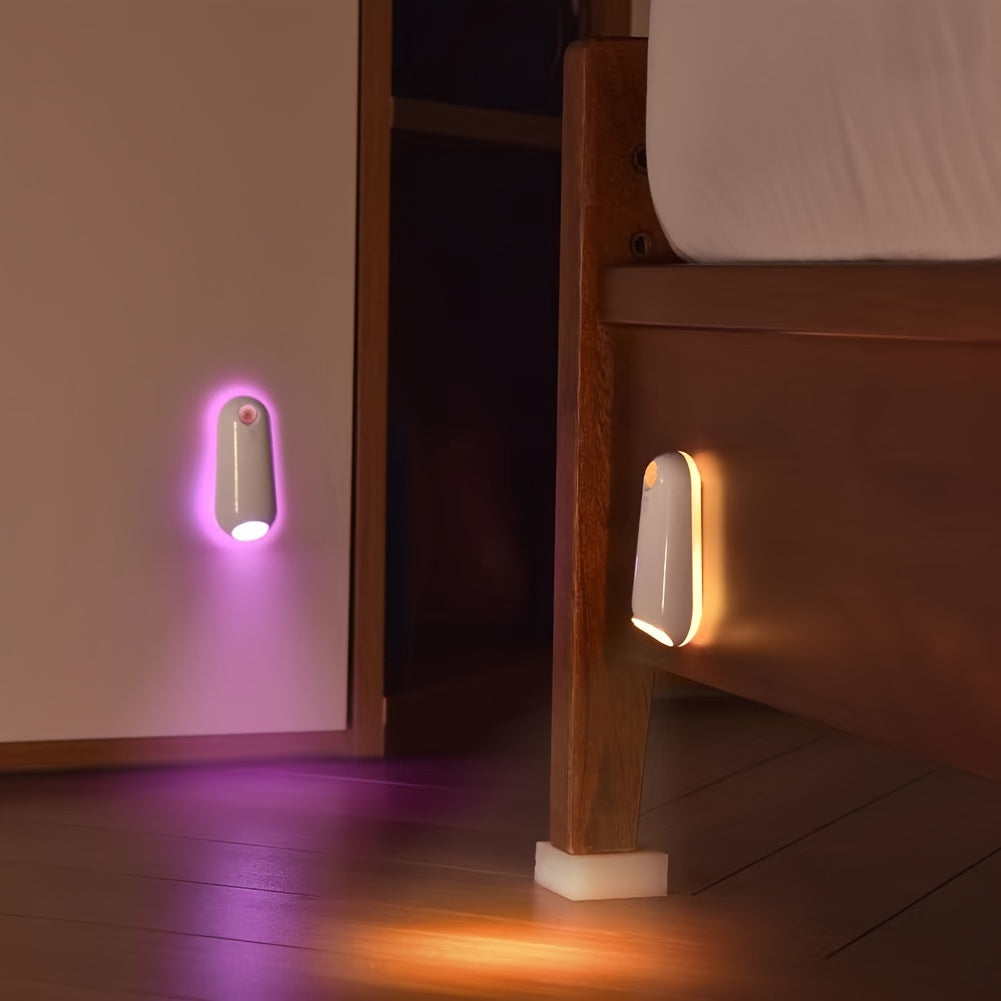 GlowStep Motion Sensor Lights mounted on wooden stairs, illuminating in purple and amber colors, demonstrating dual installation