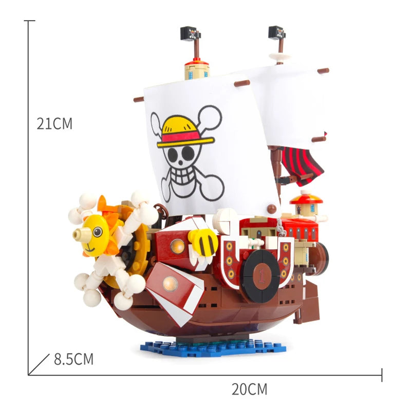 Grand Voyage collectible pirate ship model with white skull sails, brown wooden hull, and decorative lion figurehead in sailing position
