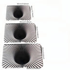 Gravity Vortex 3D Illusion Mat shown in three sizes featuring black and white spiral pattern creating optical depth effect