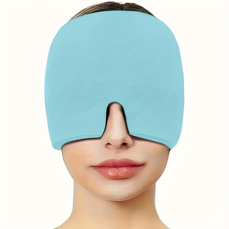 Headache Relief Cap in light blue stretchy fabric covering eyes and temples, demonstrating cold therapy head coverage