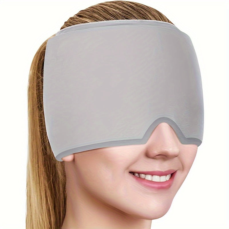 Headache Relief Cap in light gray covering eyes and temples, worn by person with blonde hair demonstrating comfort fit