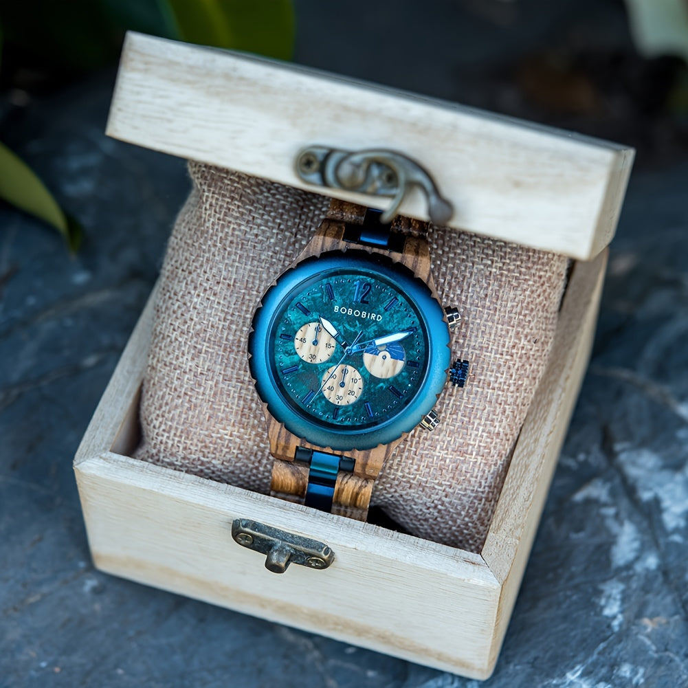 HighPeak BOBO BIRD wooden watch with blue chronograph dial and zebra wood band displayed in rustic white gift box on slate surface