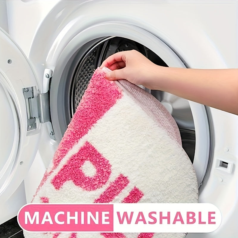 HighPeak ChillPill bathroom rug in pink and white being placed in washing machine, demonstrating machine washable feature