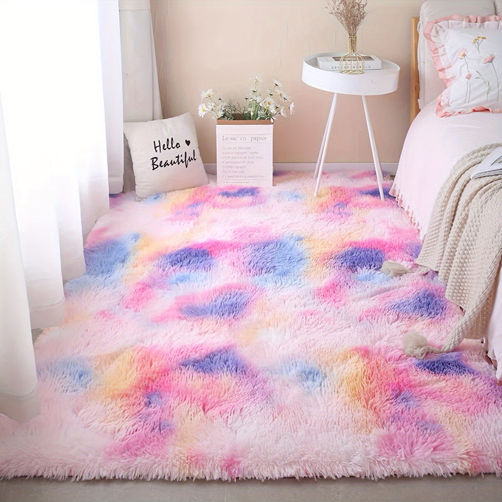HighPeak CloudCotton™ Rug with rainbow gradient colors, plush texture in bedroom setting with white side table and decorative pillows