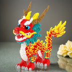HighPeak DragonForge buildable dragon figurine in red and yellow with turquoise accents - detailed block construction display piece