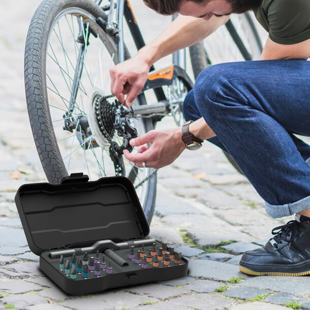 HighPeak EZ-Torque magnetic screwdriver set with color-coded bits shown repairing bicycle gears, black storage case visible