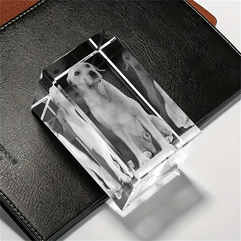 HighPeak EternaCrystal 3D laser engraved crystal pet memorial cube displaying a dog portrait on black leather surface