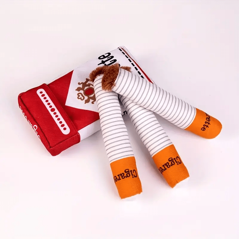 HighPeak HoundSmokes plush dog toy featuring red pack and white striped cigarettes with orange tips on white background