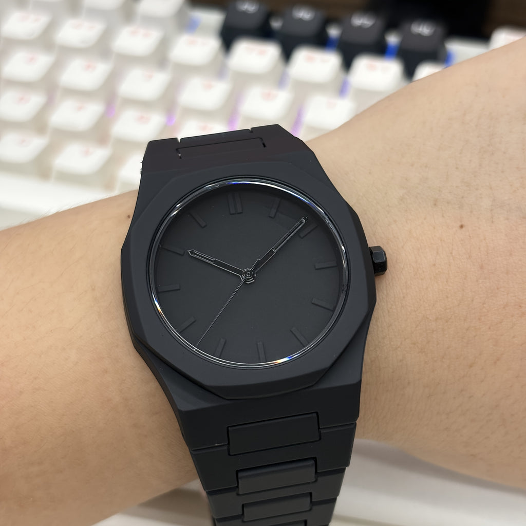 HighPeak Midnight Phantom watch in matte black stainless steel on wrist - showcasing sleek stealth design