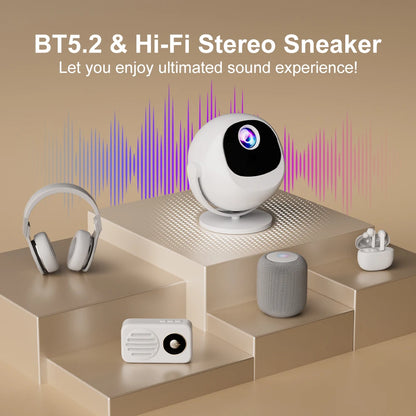 HighPeak OrbitX smart projector in white spherical design with LED display on minimalist beige platform with audio devices