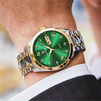 HighPeak RegalTime luxury watch with emerald green dial, two-tone gold and silver bracelet displayed on wrist in business setting