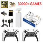 HighPeak Retro GameStick in 4K with white wireless controllers, HDMI stick, and game card - complete gaming setup