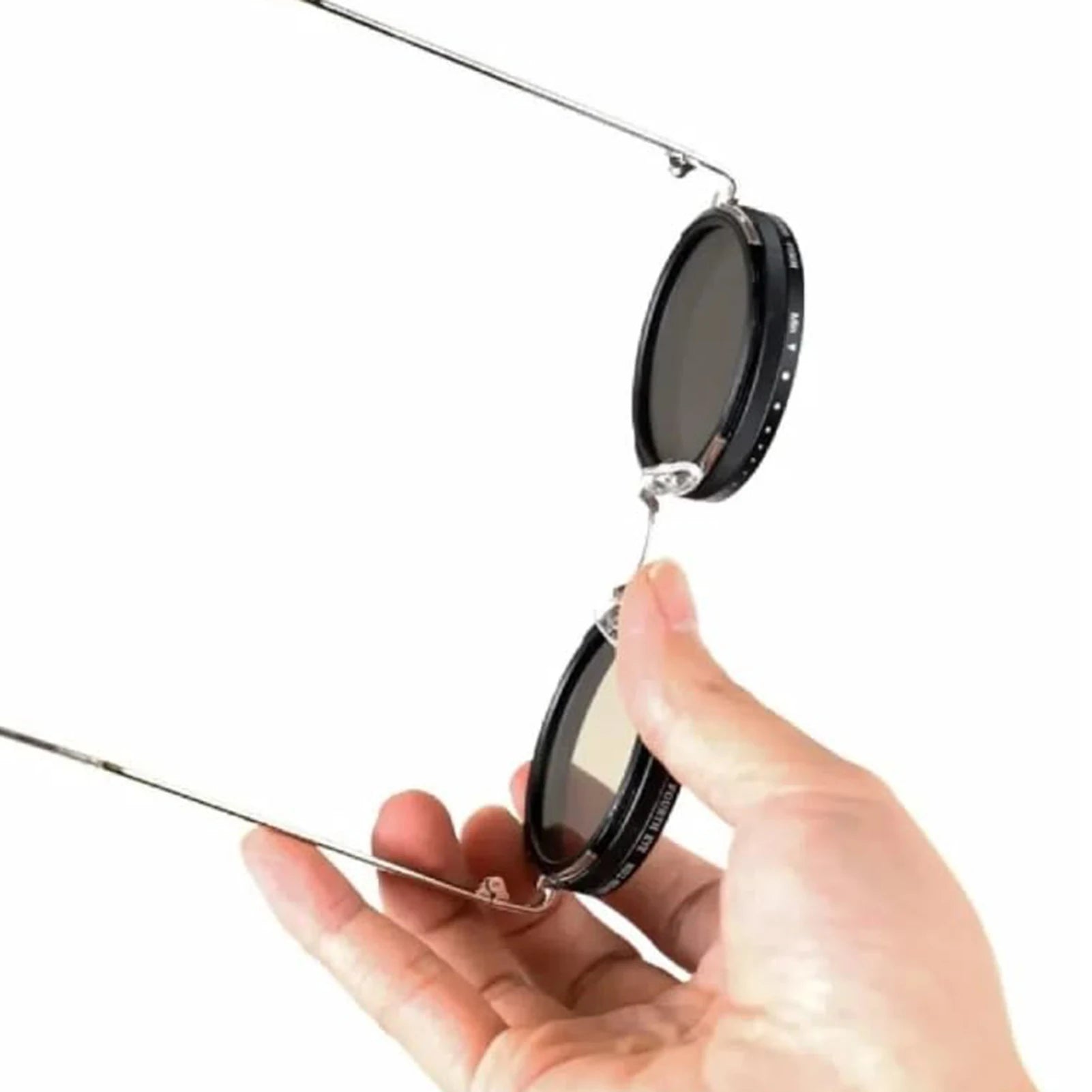 HighPeak ShiftLens adjustable sunglasses demonstrated with rotating lens mechanism on white background - innovative lens control