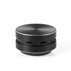 HighPeak SonicPulse bone conduction speaker in sleek black aluminum with silver trim ring on white background