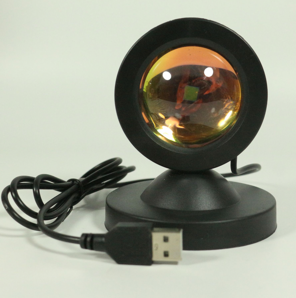 HighPeak Sunset Lamp with rainbow projection lens, black circular base, and USB power cord - ambient mood lighting
