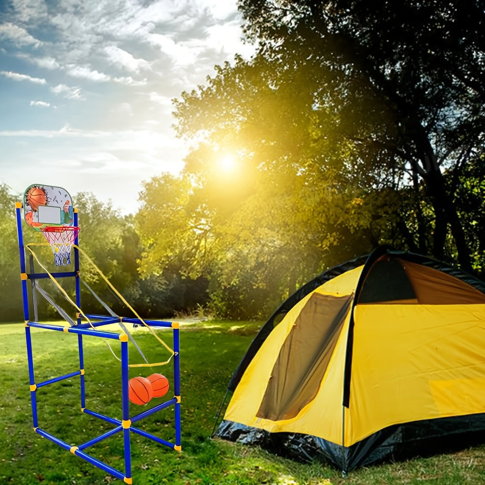 HighPeak Ultimate Basketball Hoop Set outdoors with blue frame and backboard next to yellow camping tent in sunlit backyard