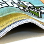 HighPeak ViceCity Disc Rug detail showing braided white edge trim against turquoise and yellow retro gaming design pattern