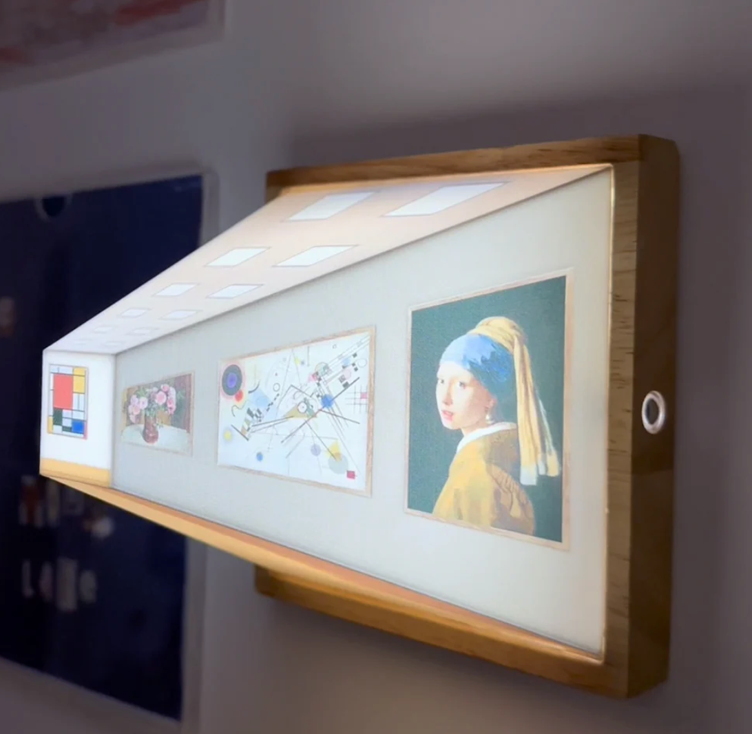 HighPeak Wallusion frame displaying classic artworks in wooden frame with 3D illusion effect - mounted on white wall