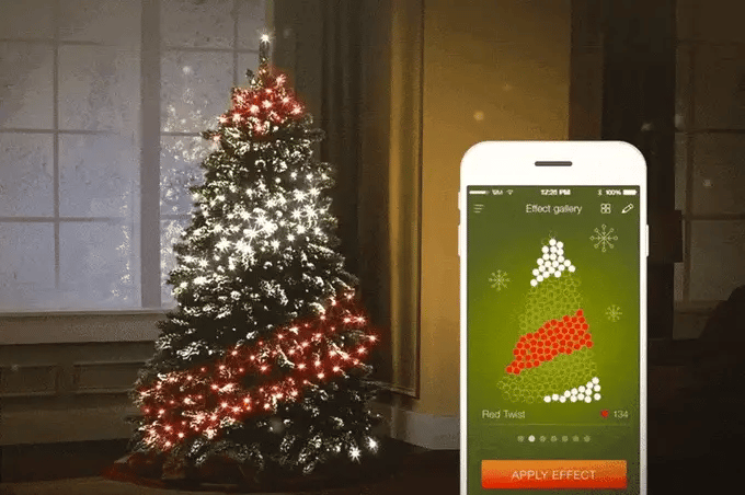 HolidayGlow Lights on Christmas tree displaying red and white pattern with smartphone app control interface showing tree design