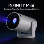 HighPeak INFINITY Mini projector in white with lens light on, highlighting portable and powerful design for VisionHack Projector Bundle