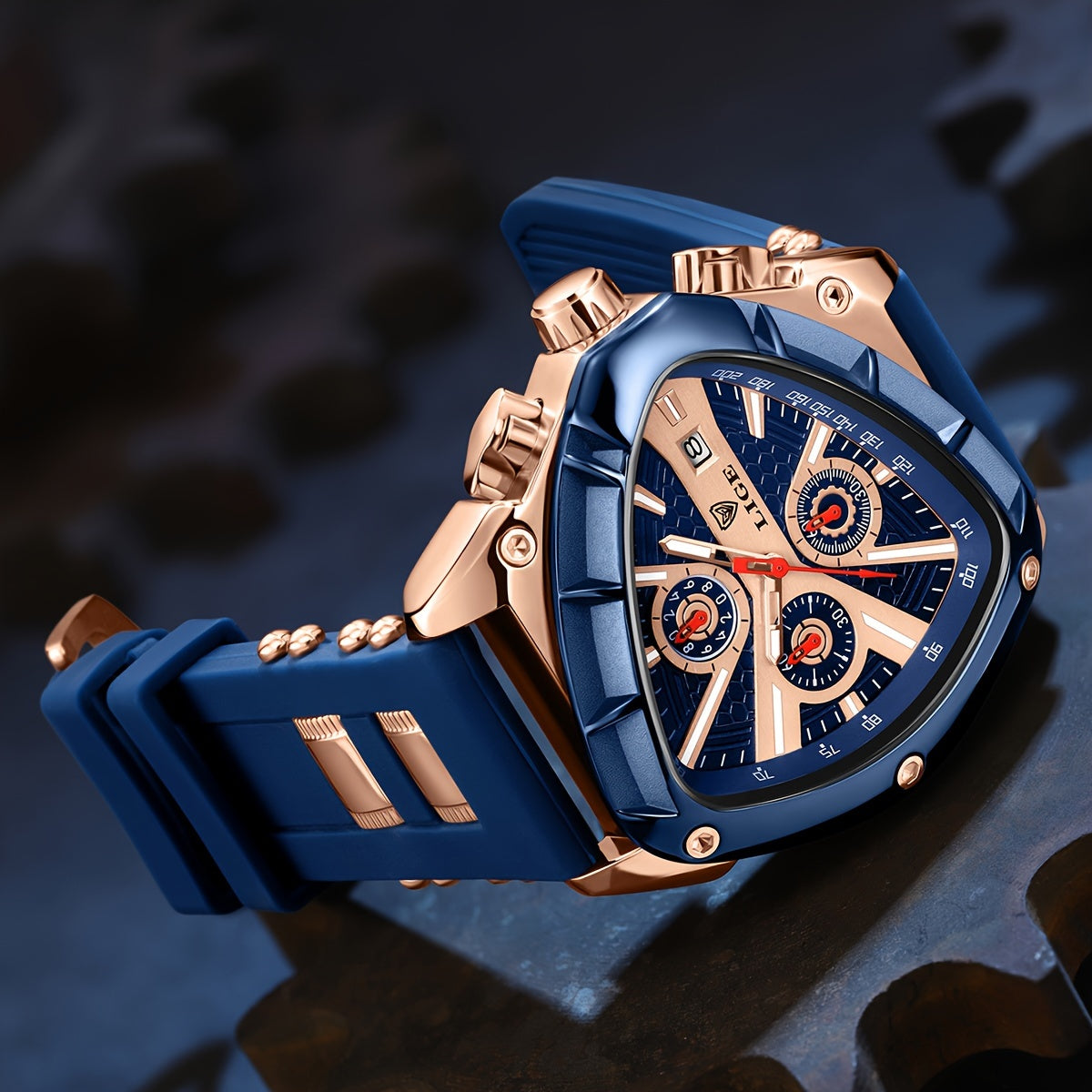 LIGE ApexChron triangular sports watch with navy blue silicone strap and rose gold accents, displaying chronograph dials on dark background