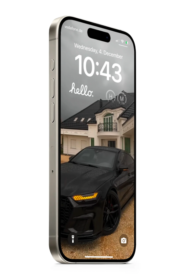 Live Phone Wallpaper displaying sleek black sports car with yellow LED headlights parked outside luxury home on iPhone screen