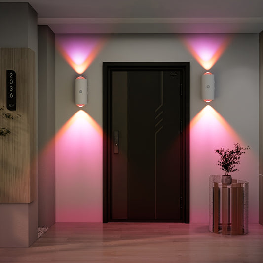 LumeGlow motion-sensing wall lights casting pink ambient glow around modern black door entrance with decorative plant