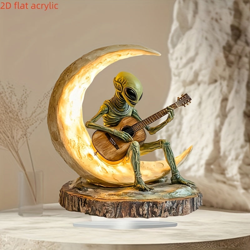 Lunar Strummer sculpture with glowing crescent moon featuring alien guitarist on wooden base - cosmic ambient light decor