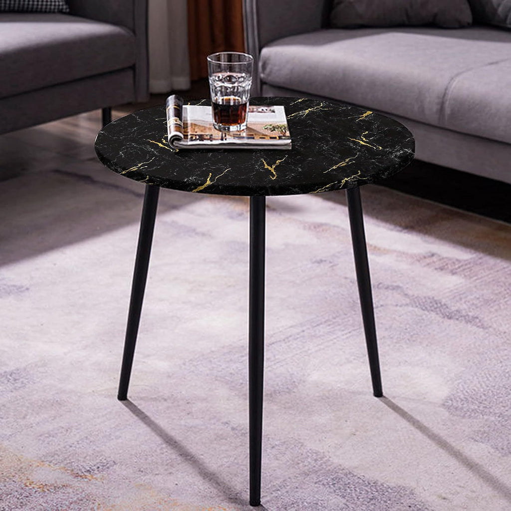 LuxeMarble Vinyl Wrap shown on modern side table with black marble and gold veining, styled with beverage and magazine