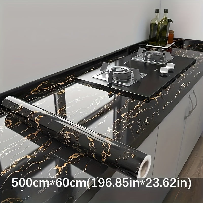 LuxeMarble vinyl wrap in black and gold marble pattern showcased on modern kitchen countertop with stovetop installation