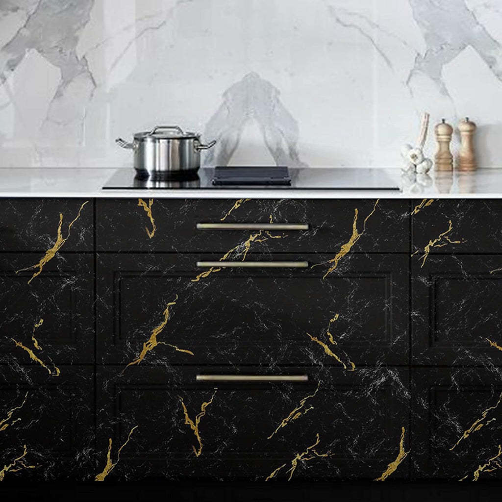 LuxeMarble vinyl wrap showcasing black marble pattern with gold veining on kitchen cabinets - modern luxury renovation example