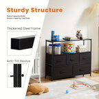 Modern black HighPeak TV Stand & Dresser with 5 drawers and open shelf, displaying storage items in cozy room setting