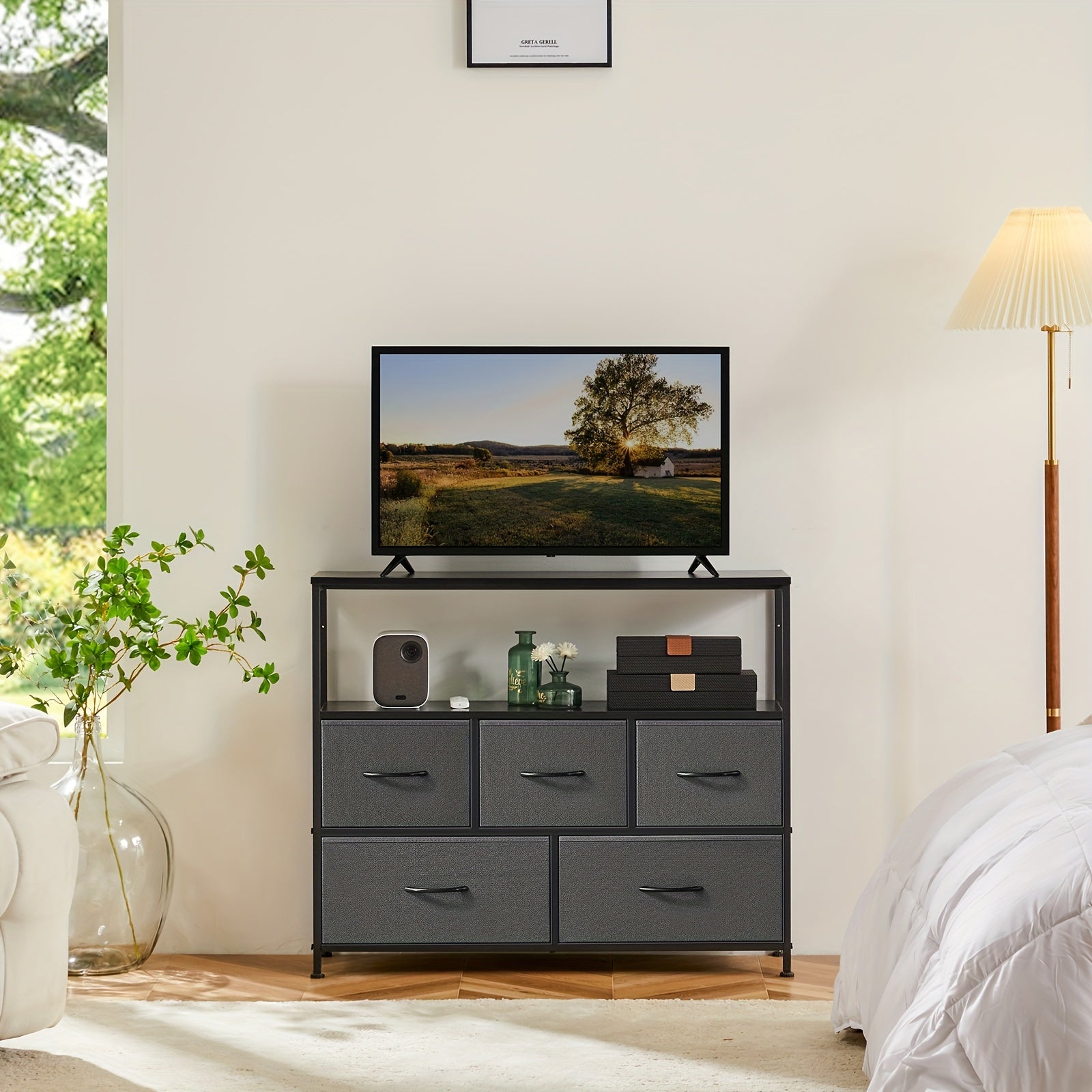 Modern gray HighPeak TV Stand & Dresser with 5 drawers and open shelf display, featuring flat-screen TV and decor items